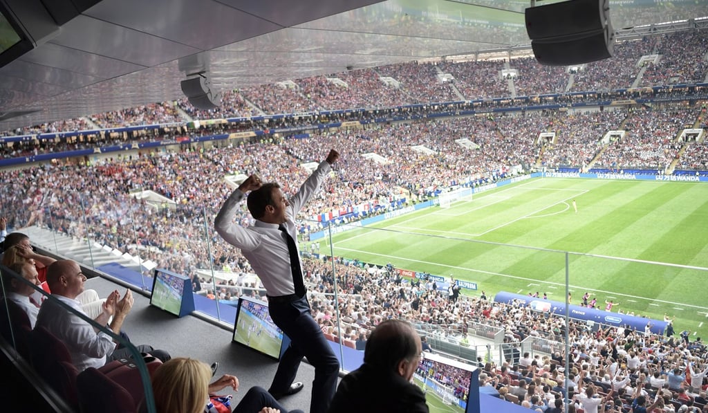 Macron cheers France on during the match from the VIP area at the Luzhniki Stadium. Photo: EPA