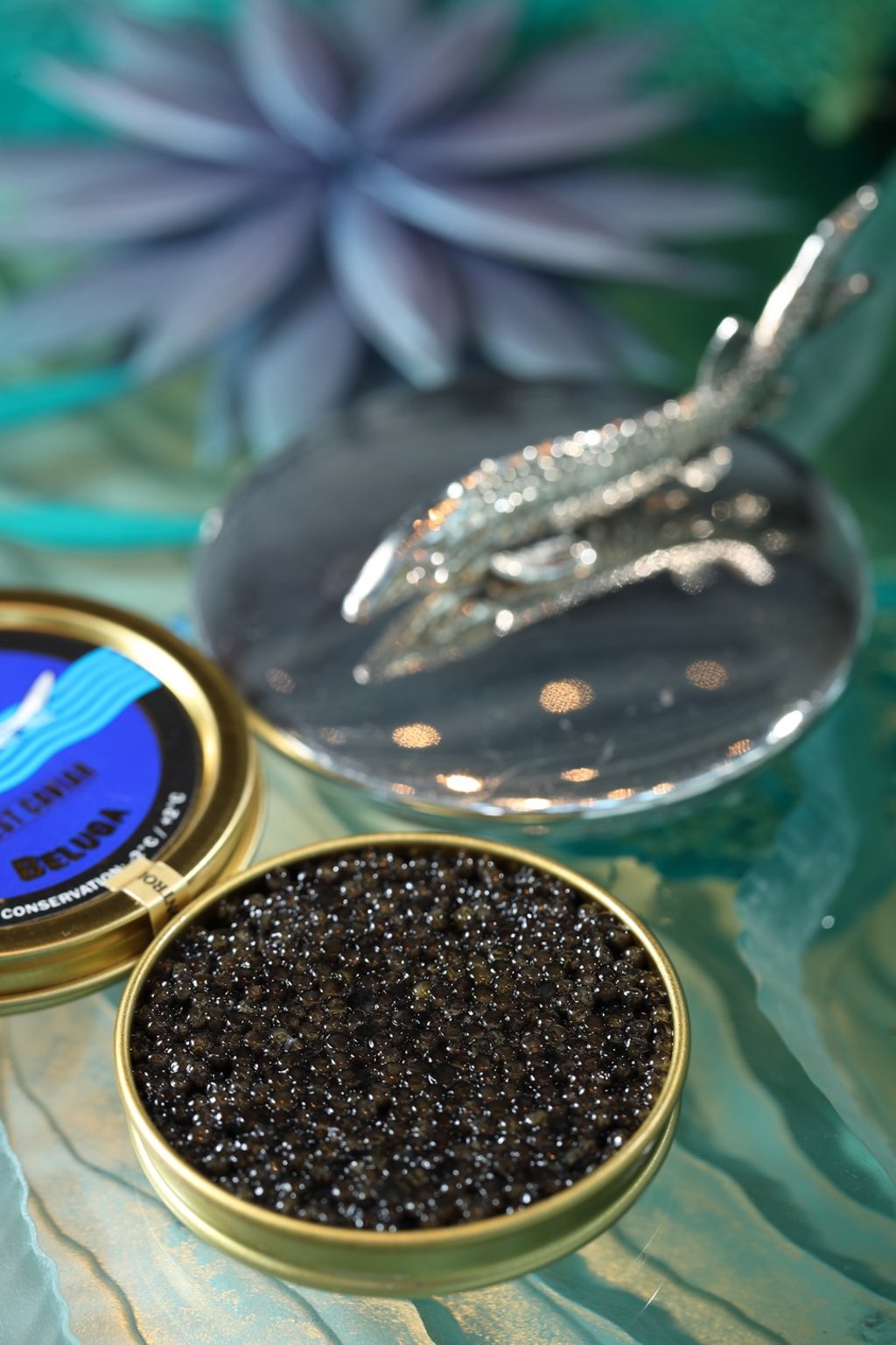 Caviar should be rolled slowly around the mouth until they pop.