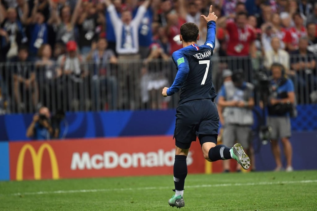 Antoine Griezmann wheels away after scoring in the World Cup final. Photo: AFP