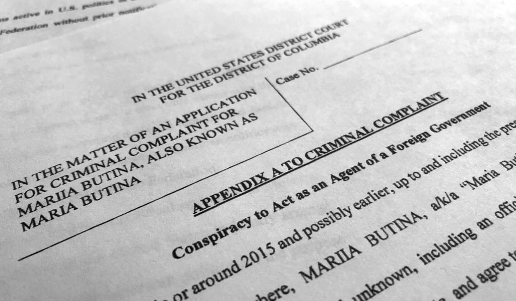 Court papers unsealed Monday, photographed in Washington, shows part of the criminal complaint against Maria Butina. Photo: AP Court papers unsealed Monday, photographed in Washington, shows part of the criminal complaint against Maria Butina. Photo: AP