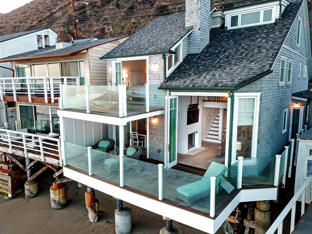 Ipe-wood decking and balconies make the most of unobstructed ocean views. Photo: Mark Hayward/TNS