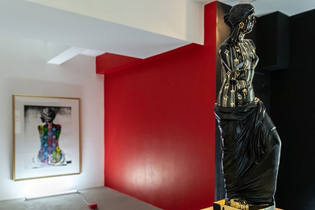 Greco-Roman-style statue sports tagged LV monograms. Greco-Roman-style statue sports tagged LV monograms.