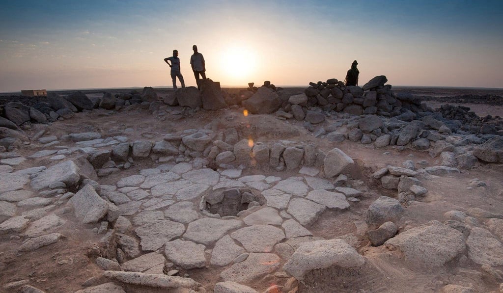 A stone structure at an archaeological site containing a fireplace, seen in the middle, where charred remains of 14,500-year-old bread was found in the Black Desert, in northeastern Jordan. Photo: Reuters