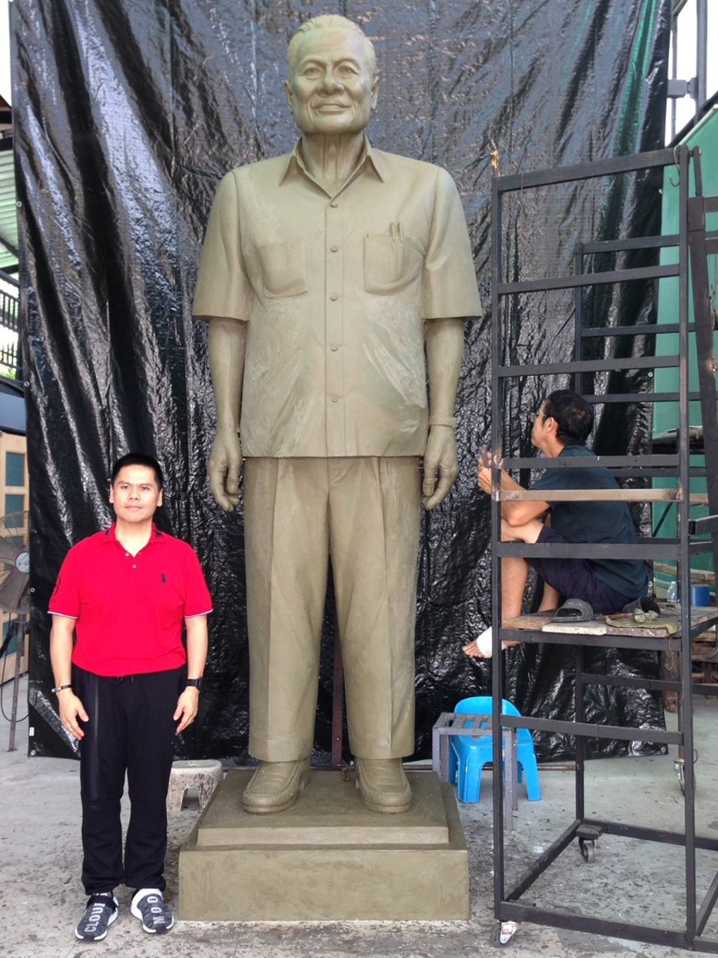 Banharn’s son Varawut stands beside the statue of his father that will be erected at the entrance in Suphan Buri, Thailand. Photo: Dragon Descendants Museum