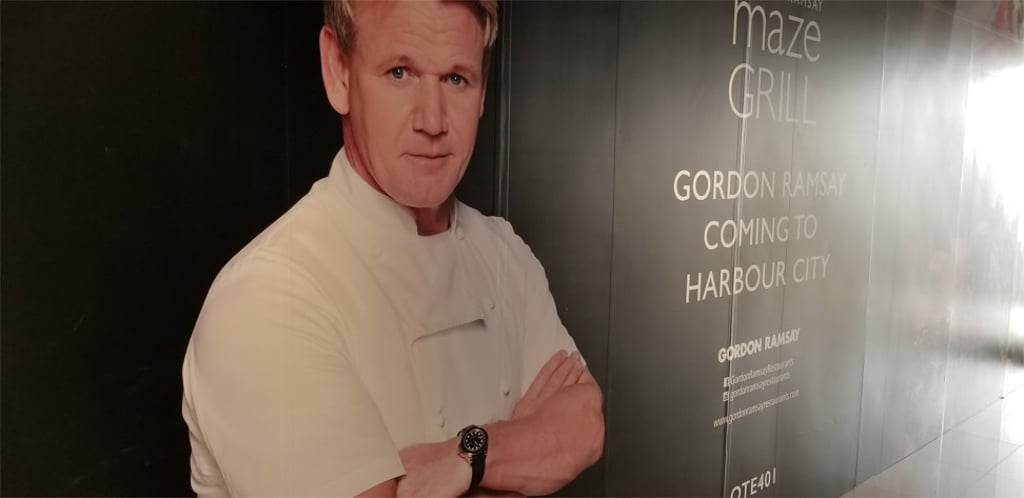 A large hoarding in Hong Kong’s exclusive Harbour City shopping mall reveals British celebrity chef Gordon Ramsay is scheduled to open his third restaurant, Maze Grill, in Hong Kong, in early October. Photo: SCMP
