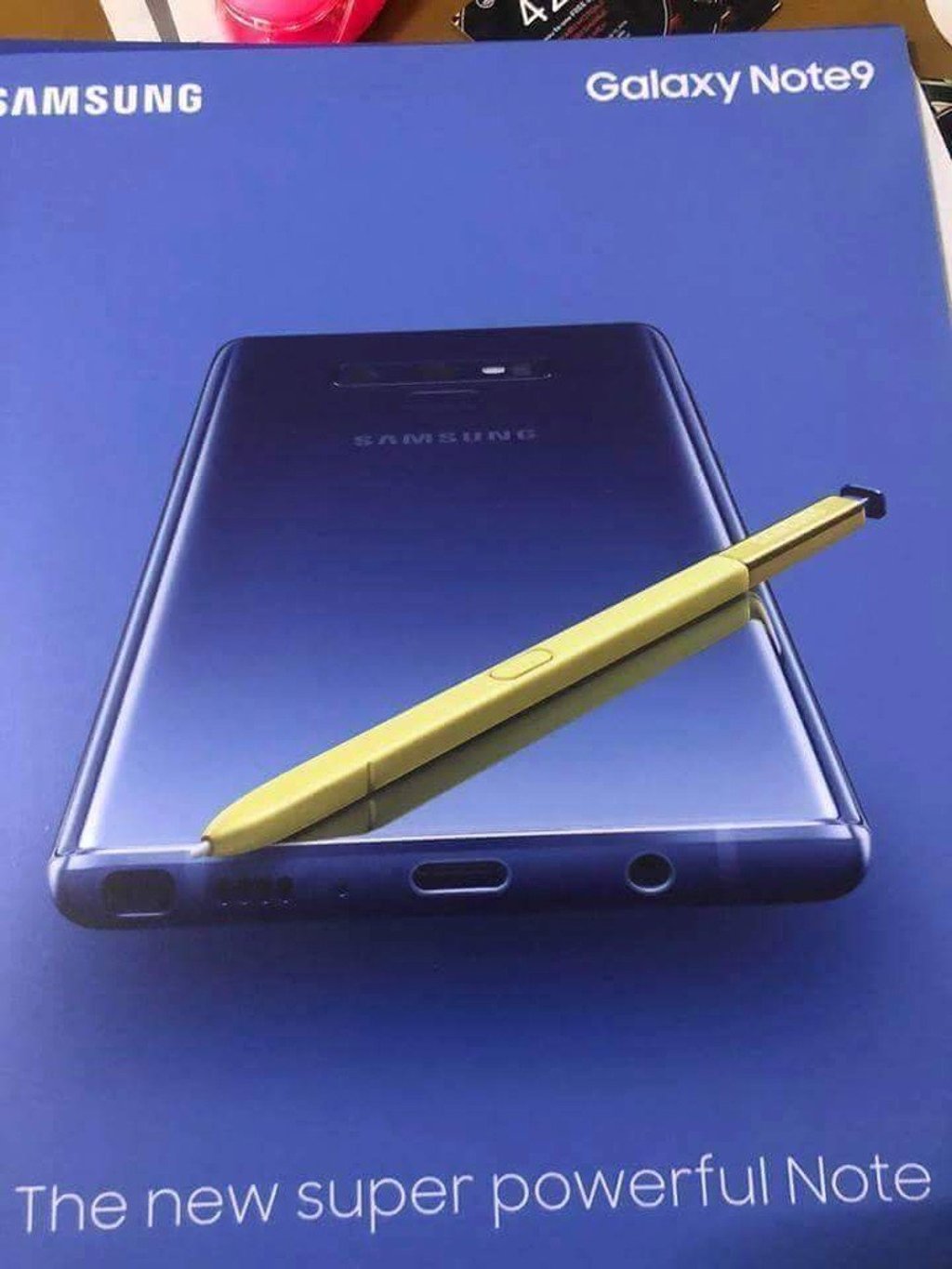 A photo which looks like a poster for the Note 9 was posted by @iceuniverse on Twitter, showing a blue phone with a gold/yellow stylus