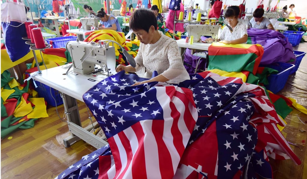 Employees sewing American flags at a Chinese factory as the US-China trade war gets underway. Photo: AFP
