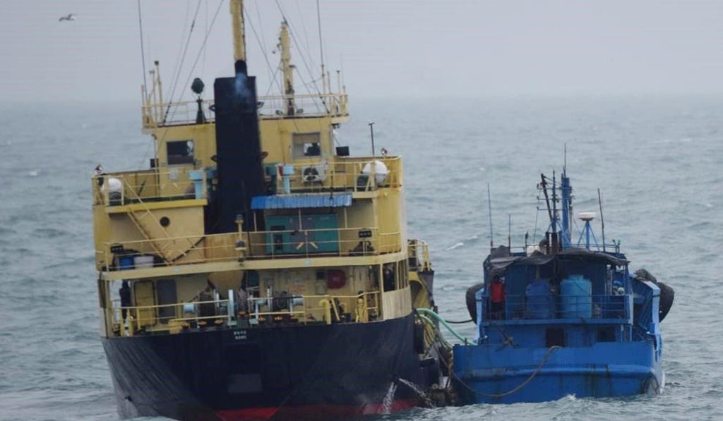 A photo released by Japan's Ministry of Defence in February shows what it says is the North Korean-flagged tanker Yu Jong 2 (left) and Min Ning De You performing a ship-to-ship transfer in the East China Sea. Photo: Ministry of Defence via AP