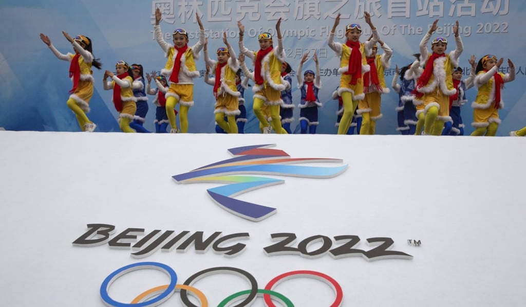 Chinese performers dance during a ceremony to mark the arrival of the Olympic flag and start of the flag tour for the Winter Olympic Games Beijing 2022. Photo: AP