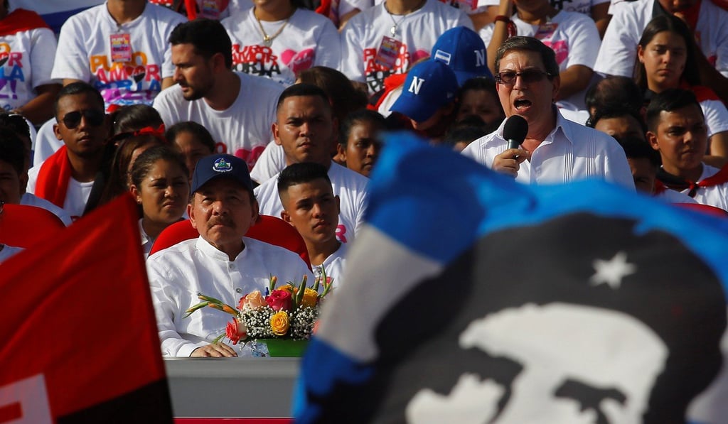 Cuba's Foreign Minister Bruno Rodriguez delivers a speech as Nicaragua's President Daniel Ortega looks on during an event to mark the 39th anniversary of the Sandinista revolution in Managua on Thursday. Photo: Reuters