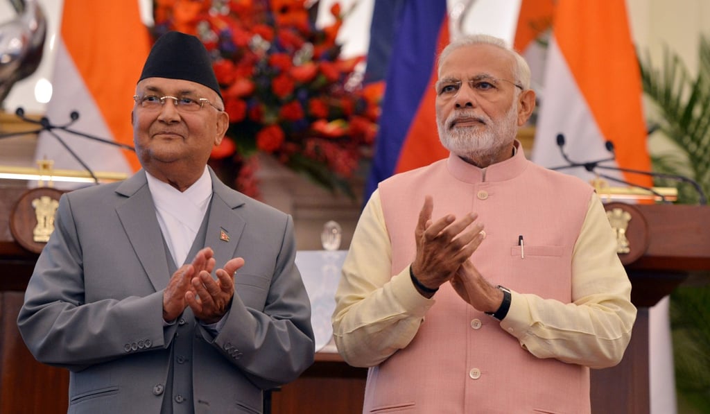 Indian Prime Minister Narendra Modi, right, and Nepalese Prime Minister Khadga Prasad Sharma Oli in New Delhi. Photo: EPA