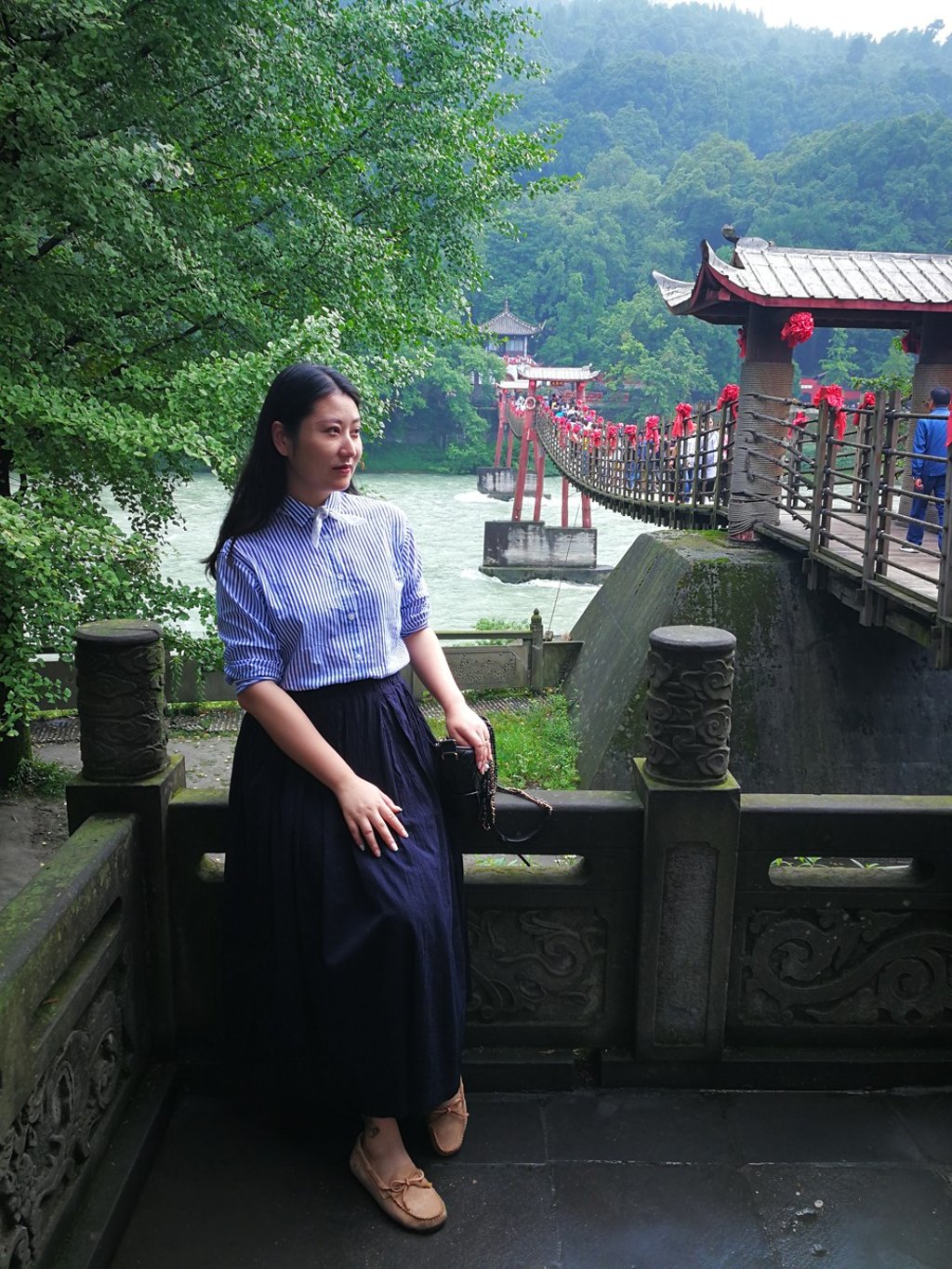 Qiu Chi, a professional photographer who is a Bikego guide, offers customers photos as part of their tour.