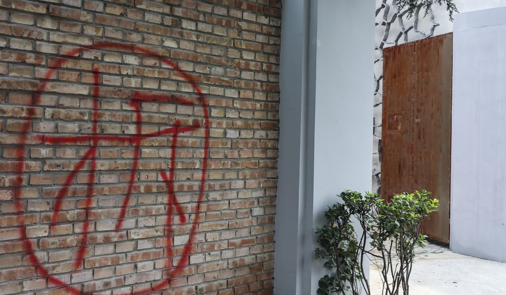 The scene that confronted Nessa Cai, manager of the de Sarthe Gallery Beijing this week: a big cai, the Chinese character which means demolish, painted on the entrance to the gallery in the suburban Caochangdi art district. Photo: Simon Song