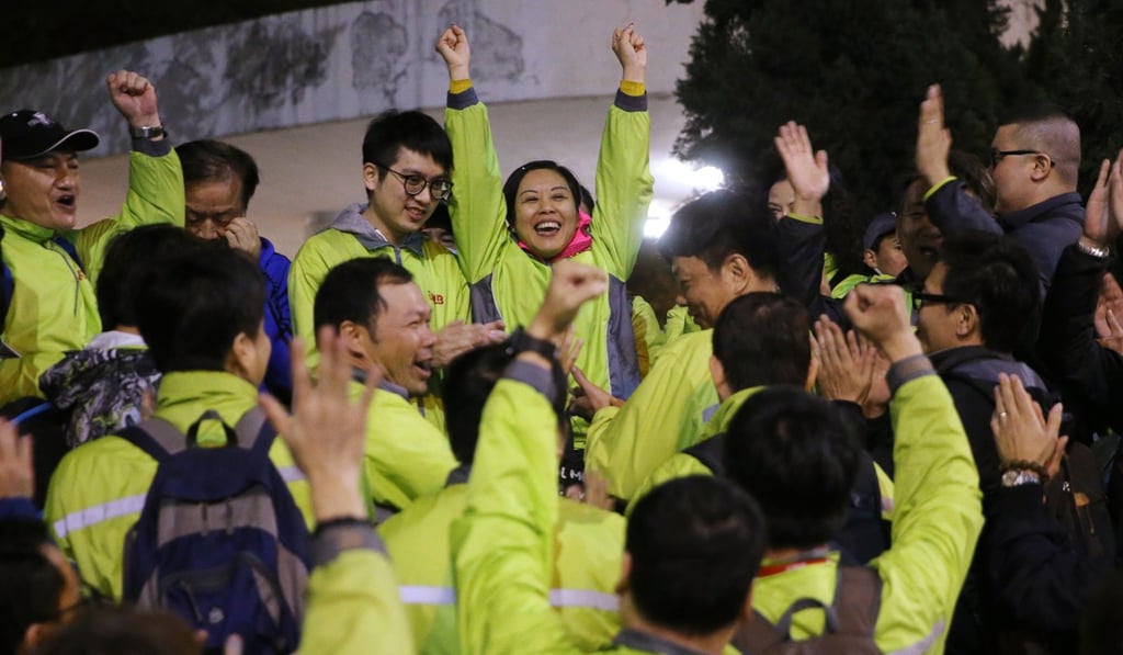 Tracy Yip with union members days after leading a wildcat strike against salary terms. Photo: Sam Tsang