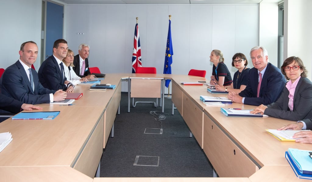 Raab and Michel Barnier (second from right) during talks in Brussels. Photo: EPA