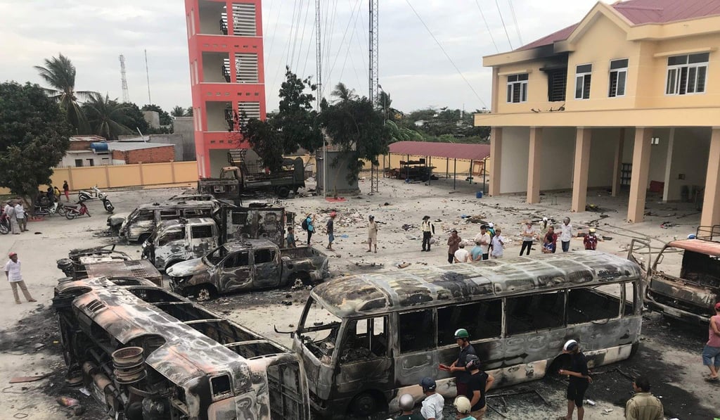 Charred buses at a police station compound in central Binh Thuan province after the June 10 protests. Photo: AFP