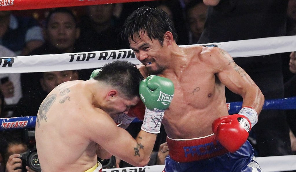 Manny Pacquiao in action against Brandon Rios in Macau in 2013. Photo: Edward Wong