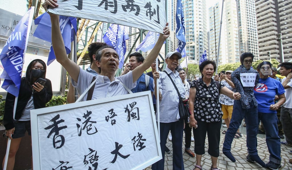 Members of the Civil Human Rights Front hold a rally to protest against the government’s move to ban the Hong Kong National Party, marching from Luard Road to the police headquarters in Wan Chai on July 21. Photo: Edmond So