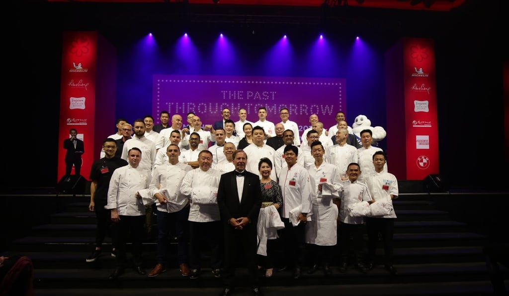 Michael Ellis, international director, Michelin Guides, on stage at Resorts World Sentosa, Singapore, with representatives of the 39 restaurants in the city recognised in the 2018 edition of the Michelin Guide Singapore. Photo: courtesy of Michelin Guides