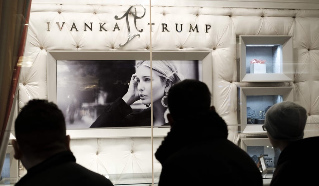 People walk past the Ivanka Trump Collection shop in the lobby at Trump Tower in New York. Photo: Drew Angerer/Getty Images via AFP People walk past the Ivanka Trump Collection shop in the lobby at Trump Tower in New York. Photo: Drew Angerer/Getty Images via AFP