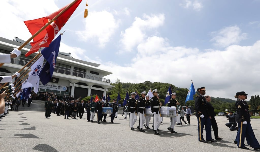 South Korean and the United Nations Command (UNC) honour guards carry coffins containing the remains of United Nations Command and South Korean soldiers during a repatriation ceremony of the soldiers' remains at the Seoul National Cemetery in Seoul on July 13. Photo: EPA