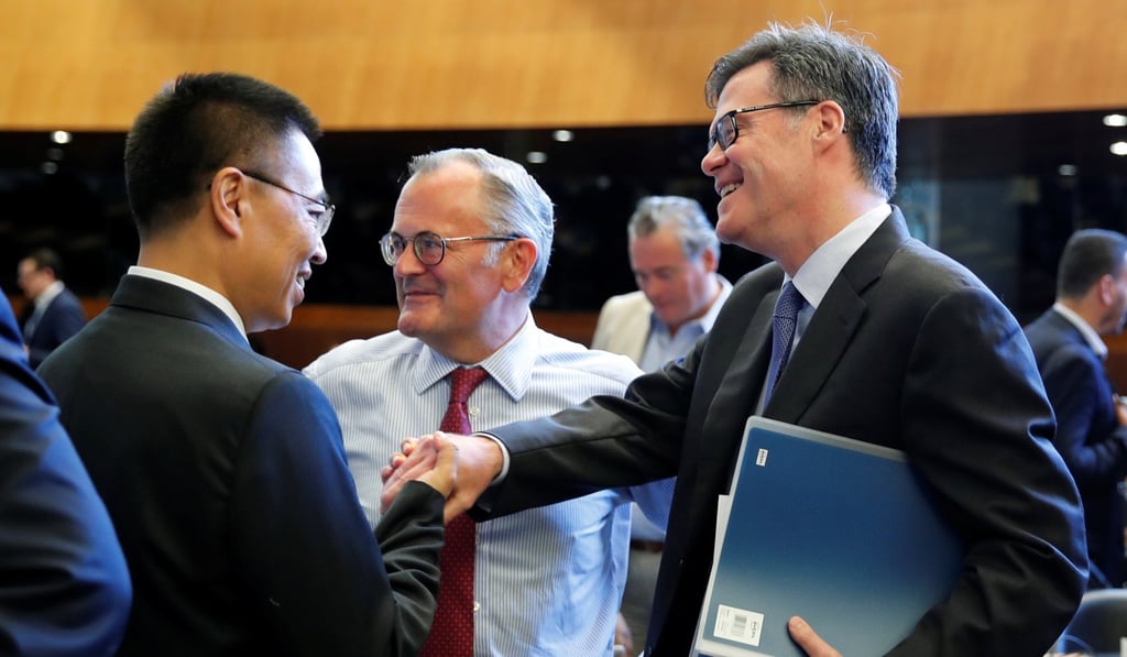 Dennis Shea (right), US Ambassador to the WTO, talks with Chinese counterpart Zhang Xiangchen before a meeting in Geneva, Switzerland, on Thursday. Photo: Reuters