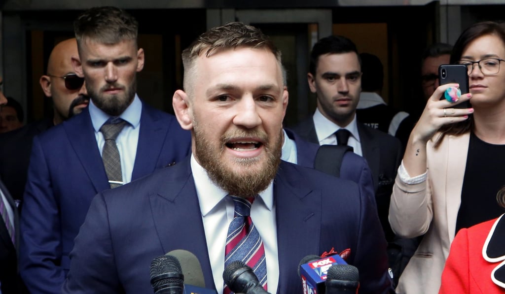 Conor McGregor speaks to the media as he exits court on Thursday. Photo: Reuters
