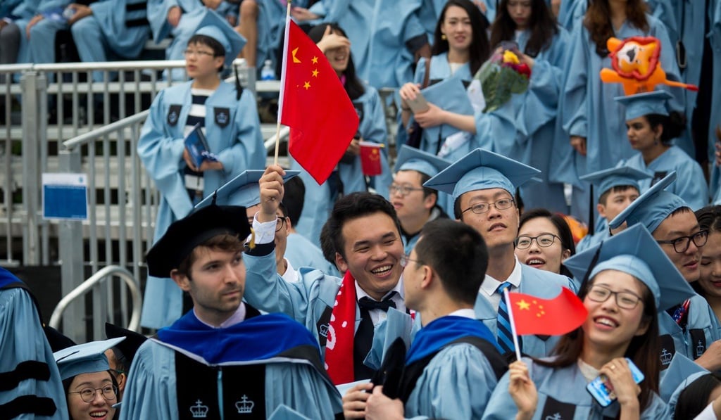 Graduates wave Chinese national flags during a commencement ceremony at Columbia University in New York on May 16. Last year, 608,000 students went abroad and 480,900 returned. Photo: Xinhua