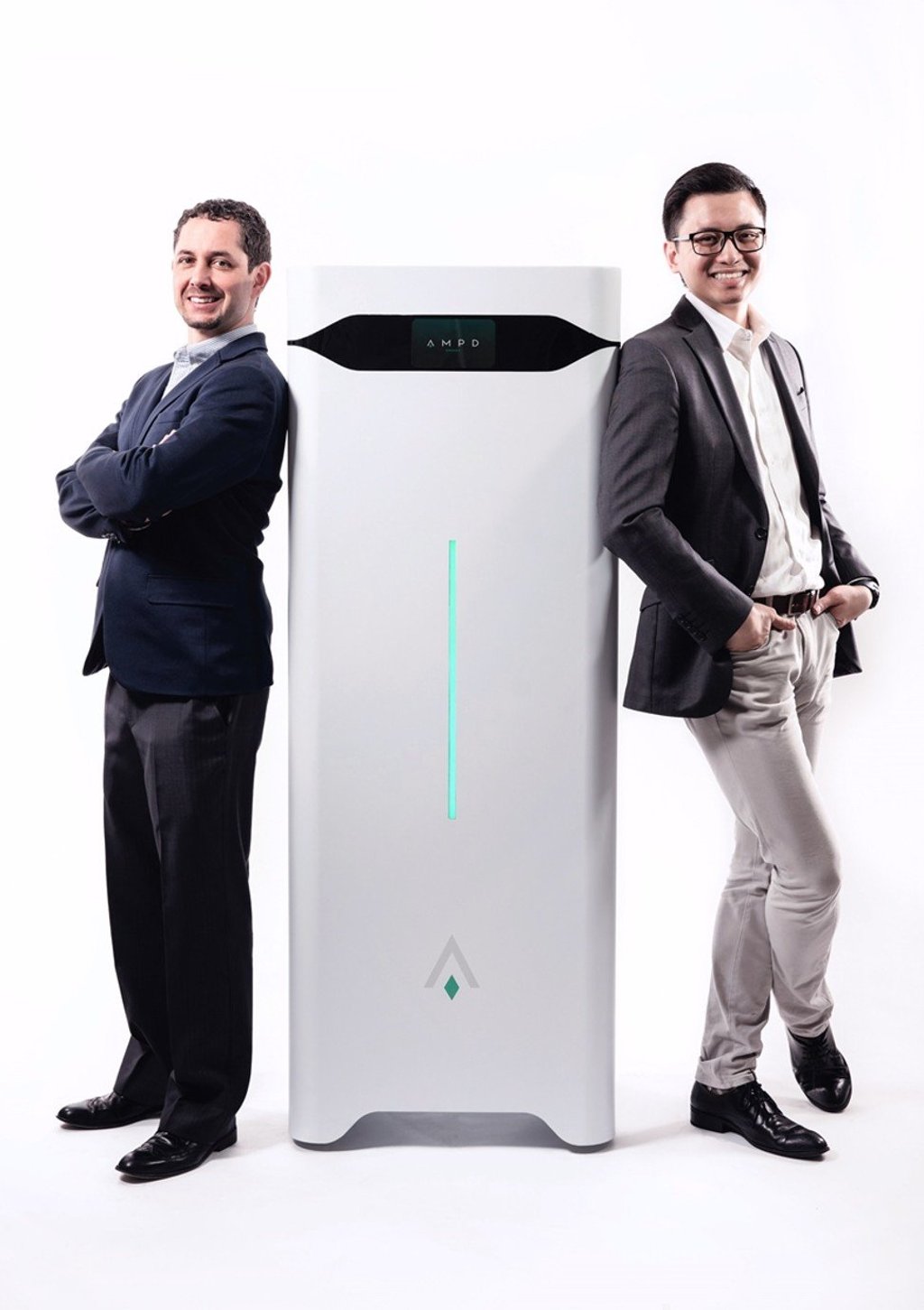 Ampd Energy founders Luca Valente (left) and Brandon Ng with their green energy storing silo. Ampd Energy founders Luca Valente (left) and Brandon Ng with their green energy storing silo.