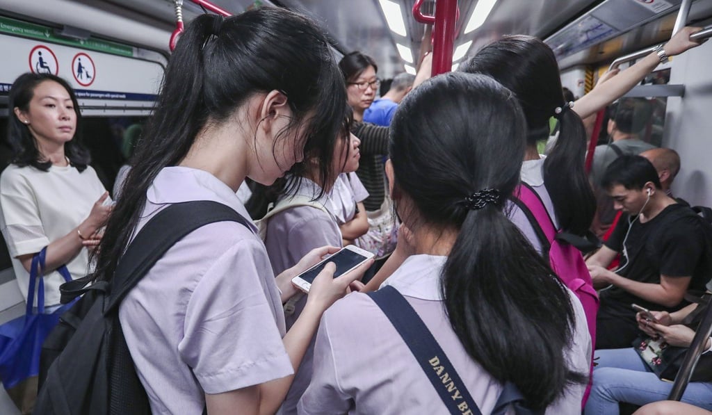 Young people seem to hate being separated from their smartphones and social media accounts for any length of time. Photo: Jonathan Wong
