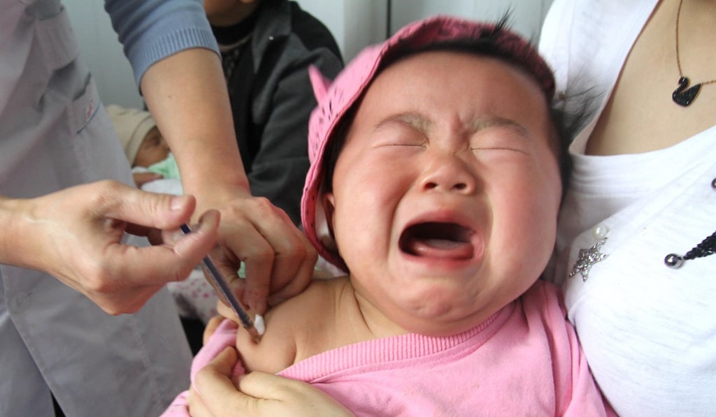 A baby receives a vaccination at the Centre For Disease Control And Prevention in Yongnian district, Handan city, China's Hebei province. Photo: Imaginechina