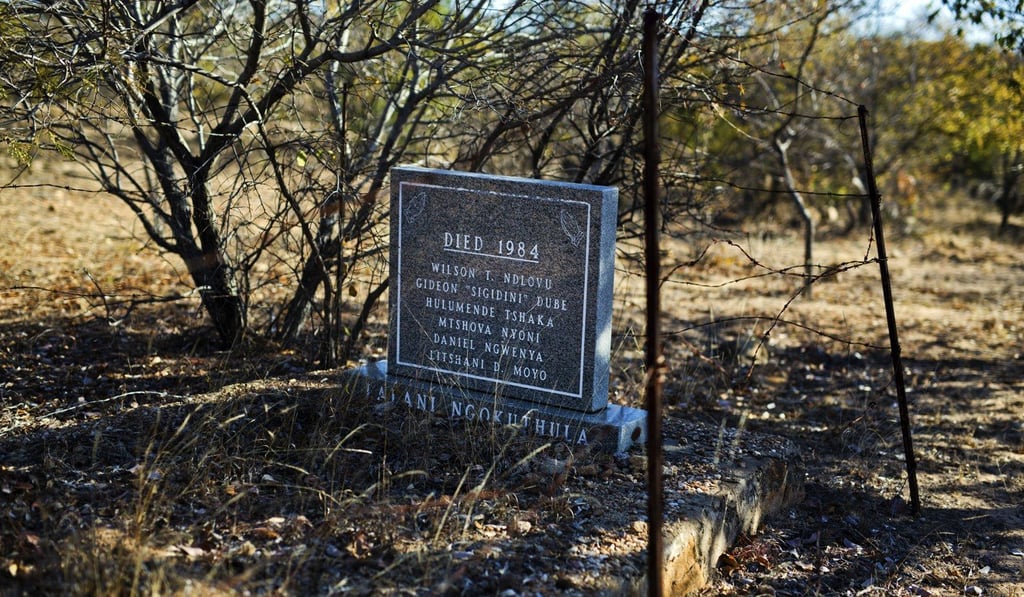 A mass grave bearing the names of six victims of the Matabeleland Massacres. Photo: AP A mass grave bearing the names of six victims of the Matabeleland Massacres. Photo: AP