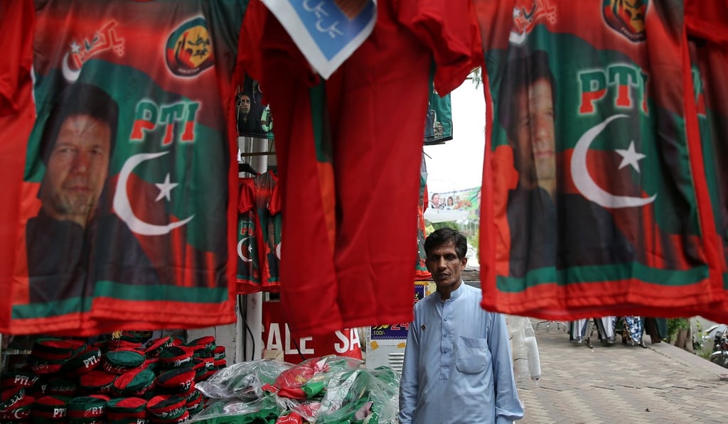 T-shirts with images of Imran Khan at a market in Islamabad, Pakistan. Photo: Reuters
