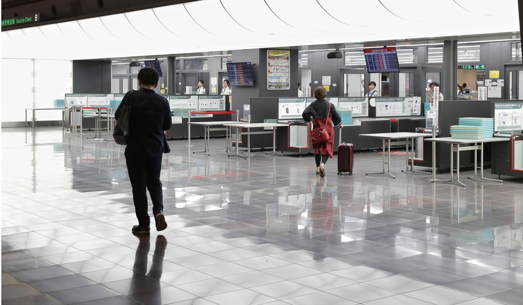 A quiet Haneda international airport in Tokyo following the cancellation of flights on Saturday, July 28, 2018. Photo: Kyodo/AP A quiet Haneda international airport in Tokyo following the cancellation of flights on Saturday, July 28, 2018. Photo: Kyodo/AP
