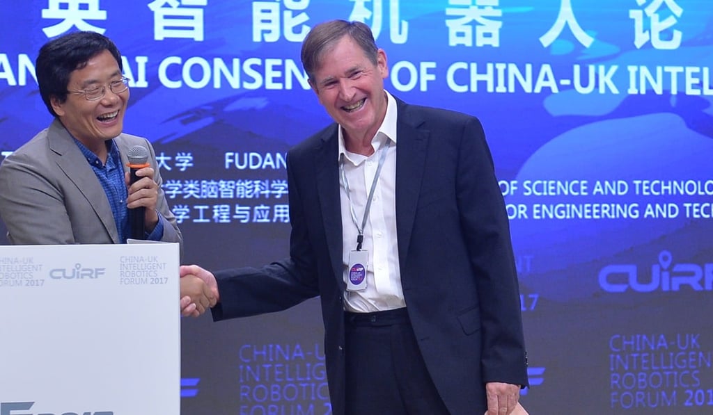 Warwick University scientists Feng Jianfeng and Edmund Rolls at a conference in Shanghai.