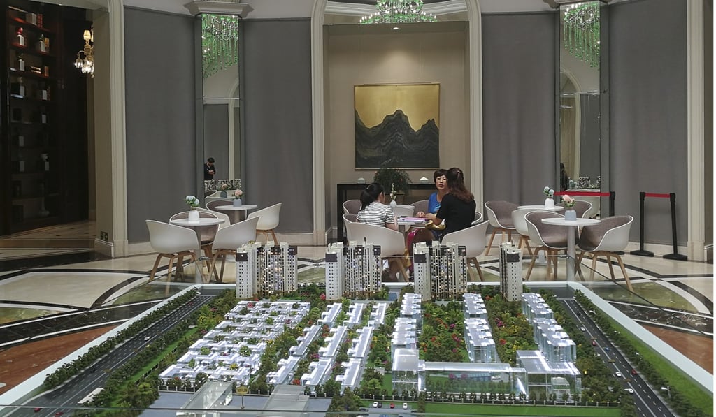 A model of Grande Harmony Emerald Residence, which is being developed by Sino-Ocean Group Holdings and two other developers, at a sales centre in Beijing. Photo: Handout