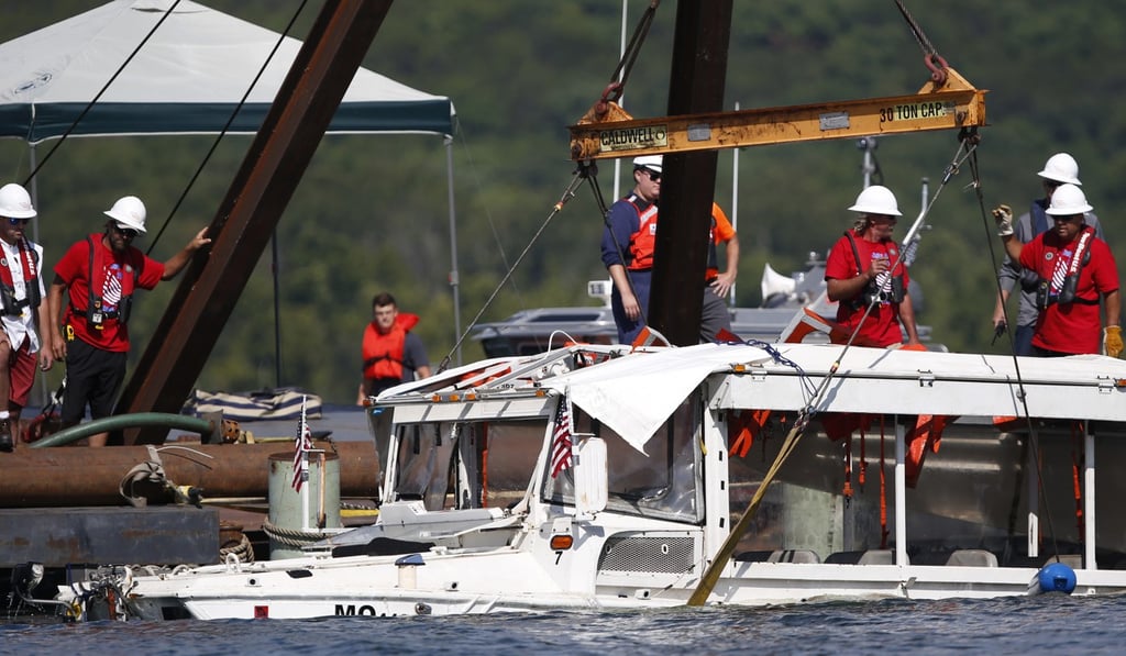 The duck boat being lifted from Table Rock Lake in Missouri on July 23. Photo: The Springfield News-Leader via AP