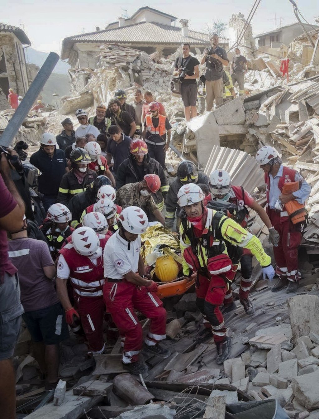 A survivor is pulled out of the rubble in Amatrice, central Italy in 2016. File photo: AP