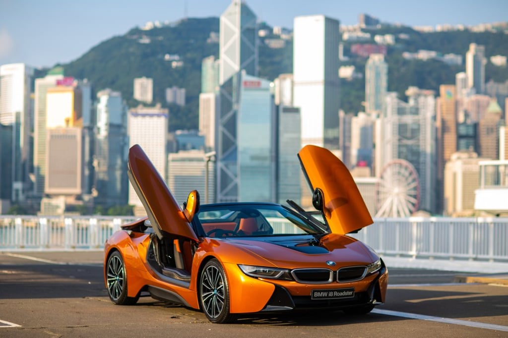The i8 Roadster, the newest model of the BMW i Series, is the brand’s first hybrid engine two-seater sports car and is powered by both electricity and fuel. The i8 Roadster, the newest model of the BMW i Series, is the brand’s first hybrid engine two-seater sports car and is powered by both electricity and fuel.