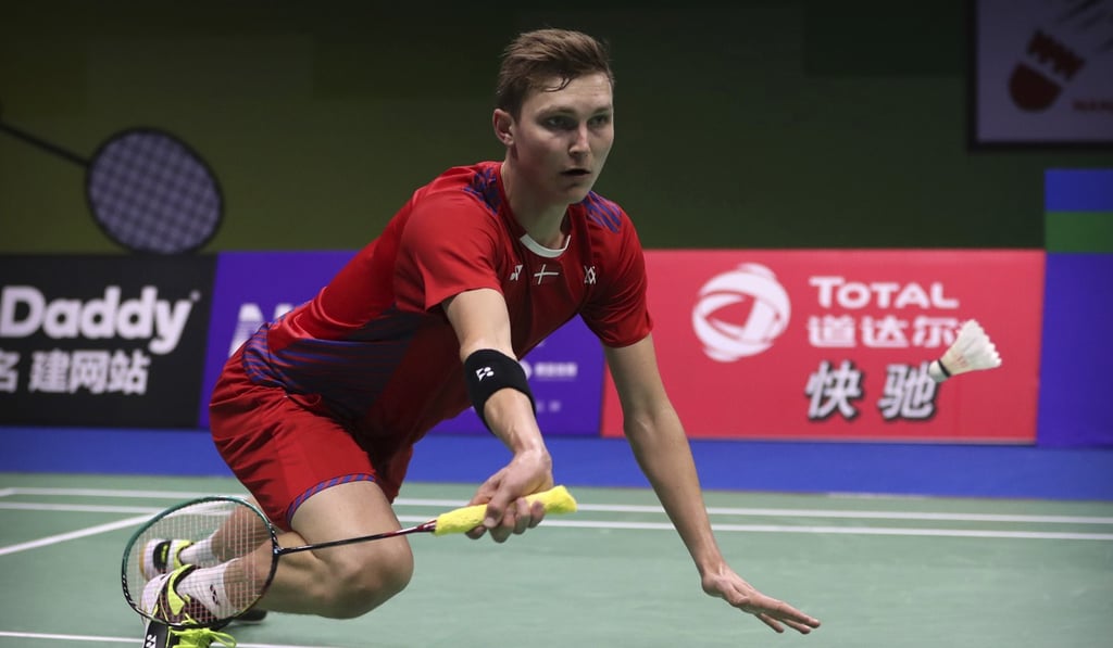 Viktor Axelsen plays a shot against China’s Huang Yuxiang. Photo: AP