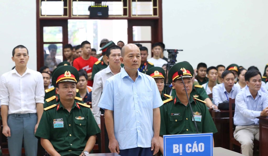 Dinh Ngoc He, a former Vietnamese colonel, was convicted of ‘abusing power in performance of official duties’ and ‘using fake documents’. Photo: Doan Tan/VNA via Reuters