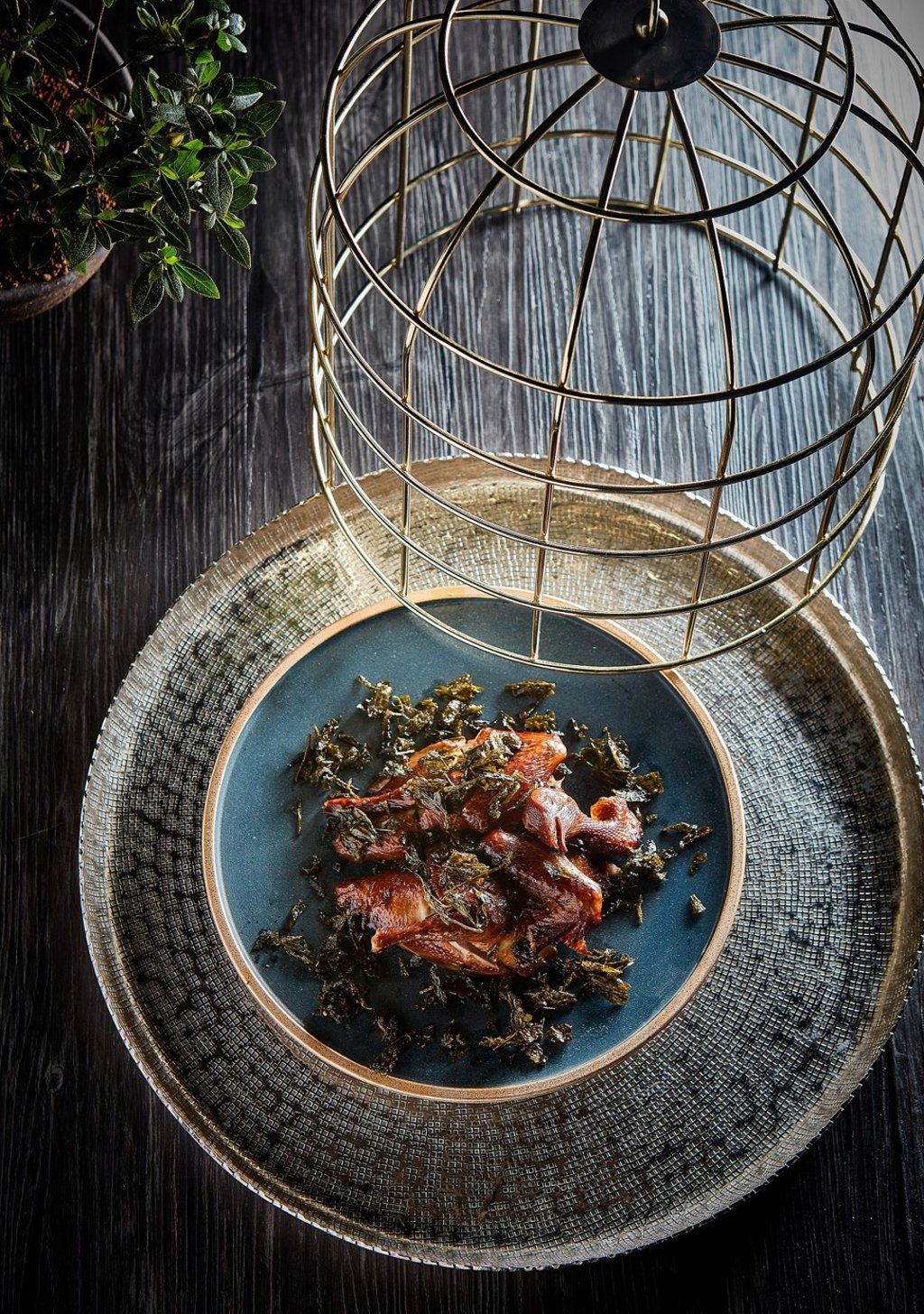 Smoke gets in your eyes but the Longjing tea-smoked pigeon is top-notch.