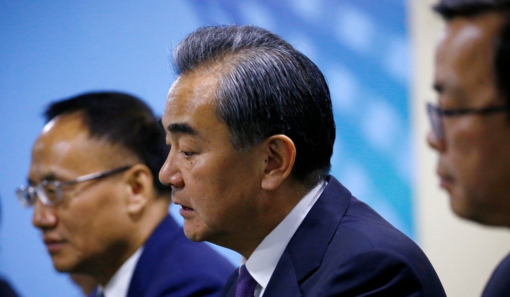 China's Foreign Minister Wang Yi speaking at a meeting with Iran’s foreign minister, on the sidelines of the Asean summit in Singapore, on Friday. Photo: Reuters