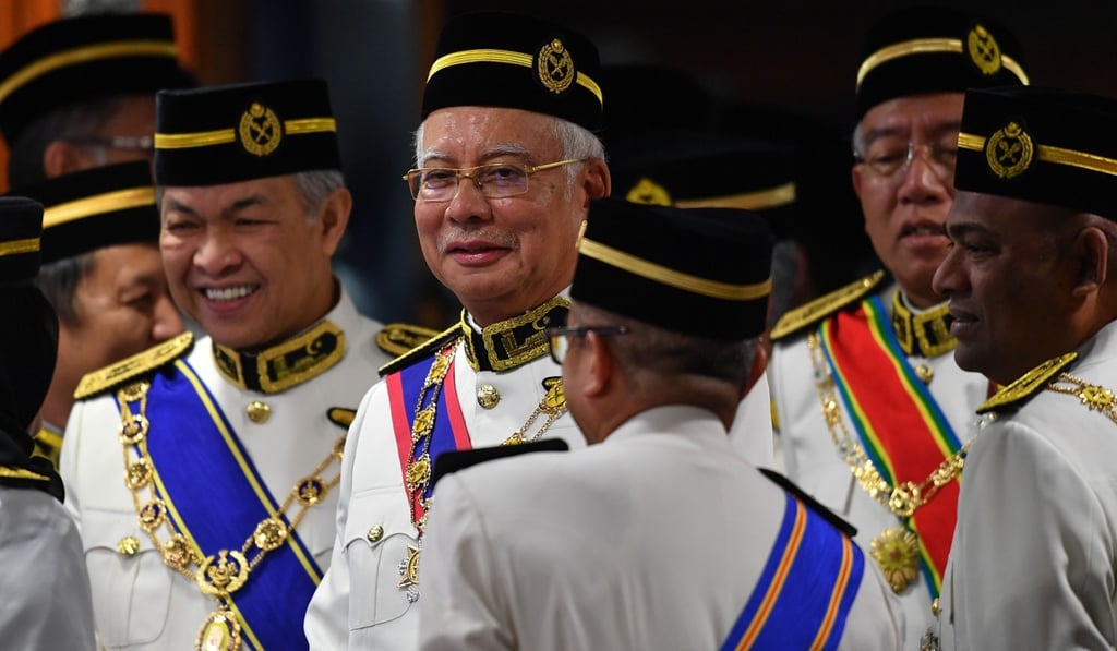 Former Malaysian prime minister Najib Razak, second from left, and former deputy prime minister Ahmad Zahid Hamidi, left, attend the opening ceremony of parliament in Kuala Lumpur. Photo: AFP