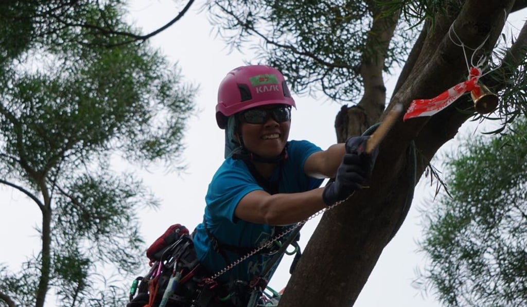 Kay Cheung rings the bell to signify she reached the top. Kay Cheung rings the bell to signify she reached the top.