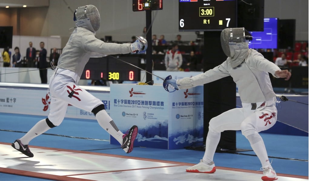 Lam Hin-chung (left) takes on Cyrus Chang at the Asian Fencing Championships in 2017. Photo: Jonathan Wong