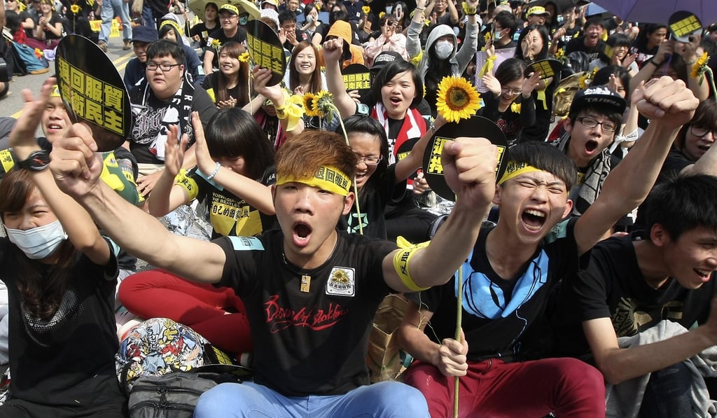 Demonstrators shout slogans in front of the Presidential Office in Taipei on March 30, 2014. The Sunflower student movement of spring 2014, in which thousands of young demonstrators marched in the streets to protest against the controversial trade pact with mainland China, may have been a turning point anticipating not only the pro-independence Democratic Progressive Party’s return to power, but even the pro-unification Kuomintang’s diminishing interest in cooperating with Beijing. Photo: Reuters