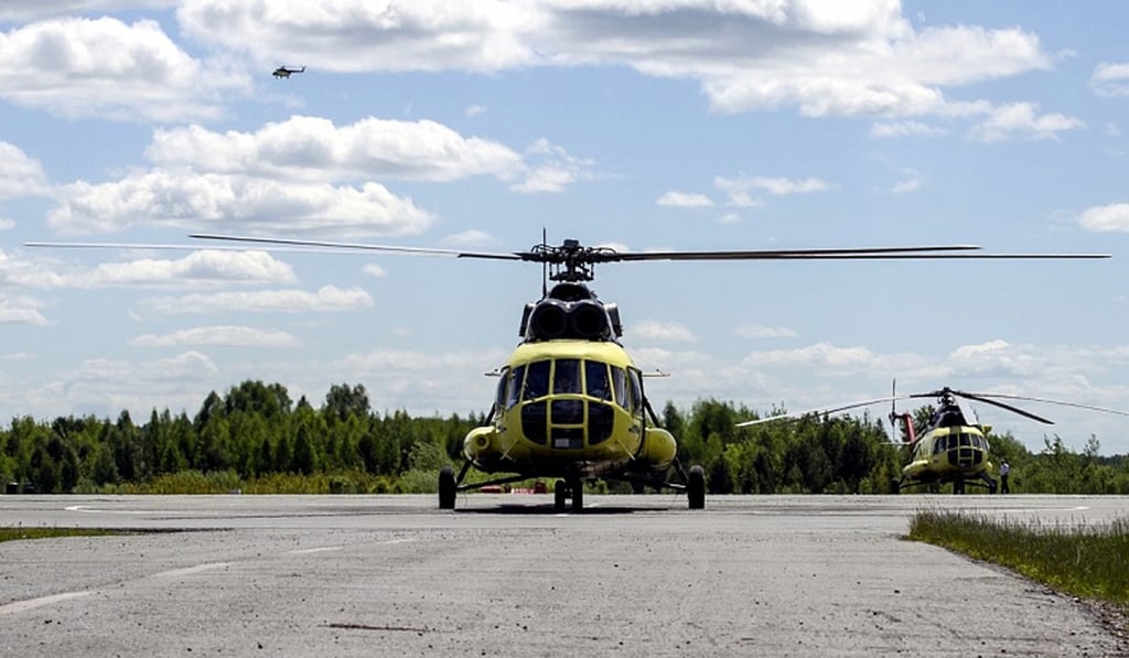 File photo of Utair Mi-8 helicopters. Photo: EPA