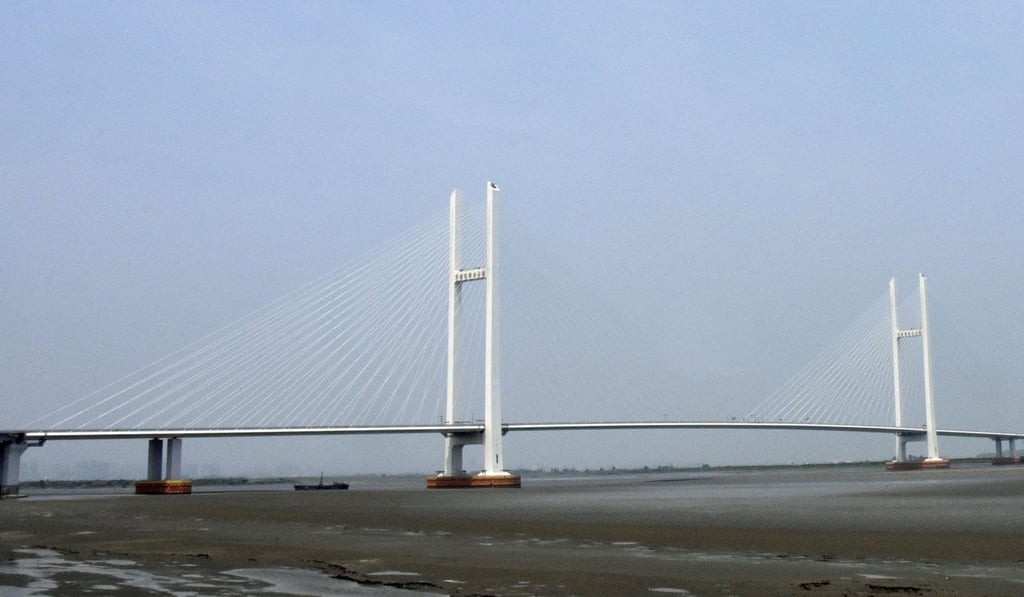 A photo taken in June shows a part of a new bridge over the Yalu River between Dandong and the North Korean county of Ryongchon. Photo: Kyodo