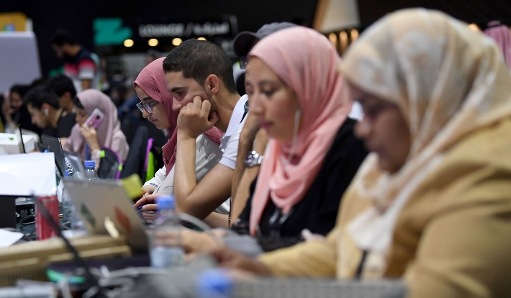Participants including Saudi women attend a hackathon in Jeddah. Photo: AFP